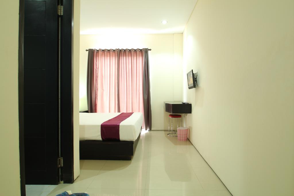 Airport Kuta Hotel And Residences Tuban Chambre photo